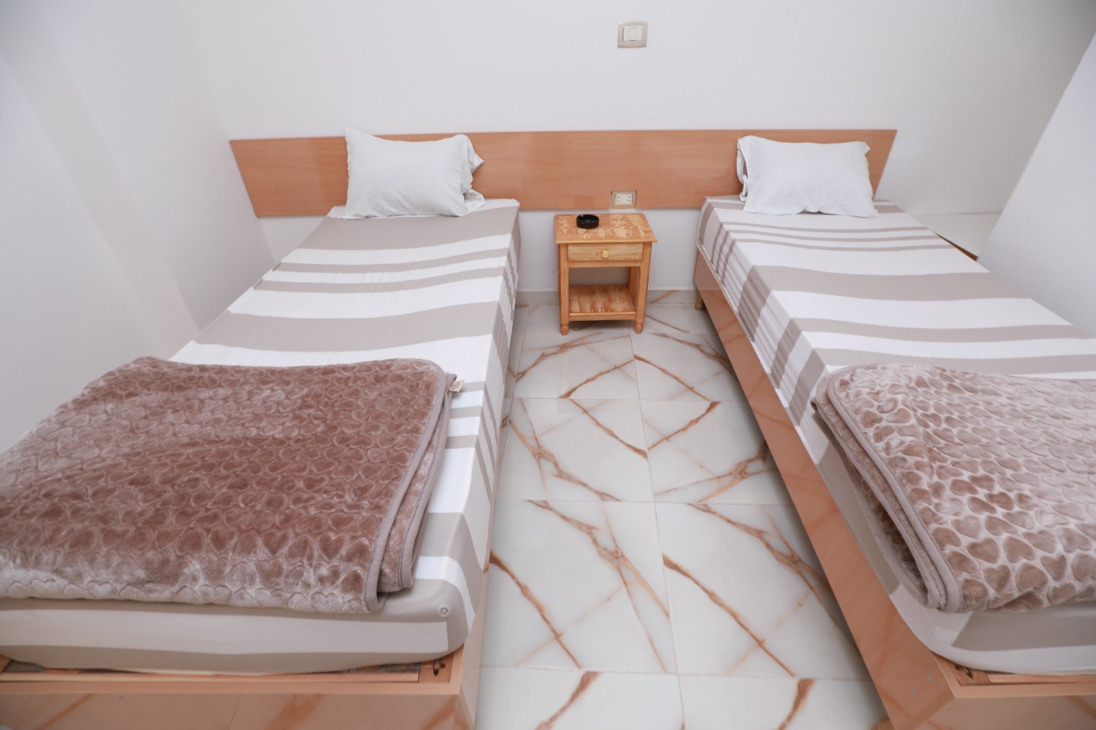 Chambre Simple — deux lits simples